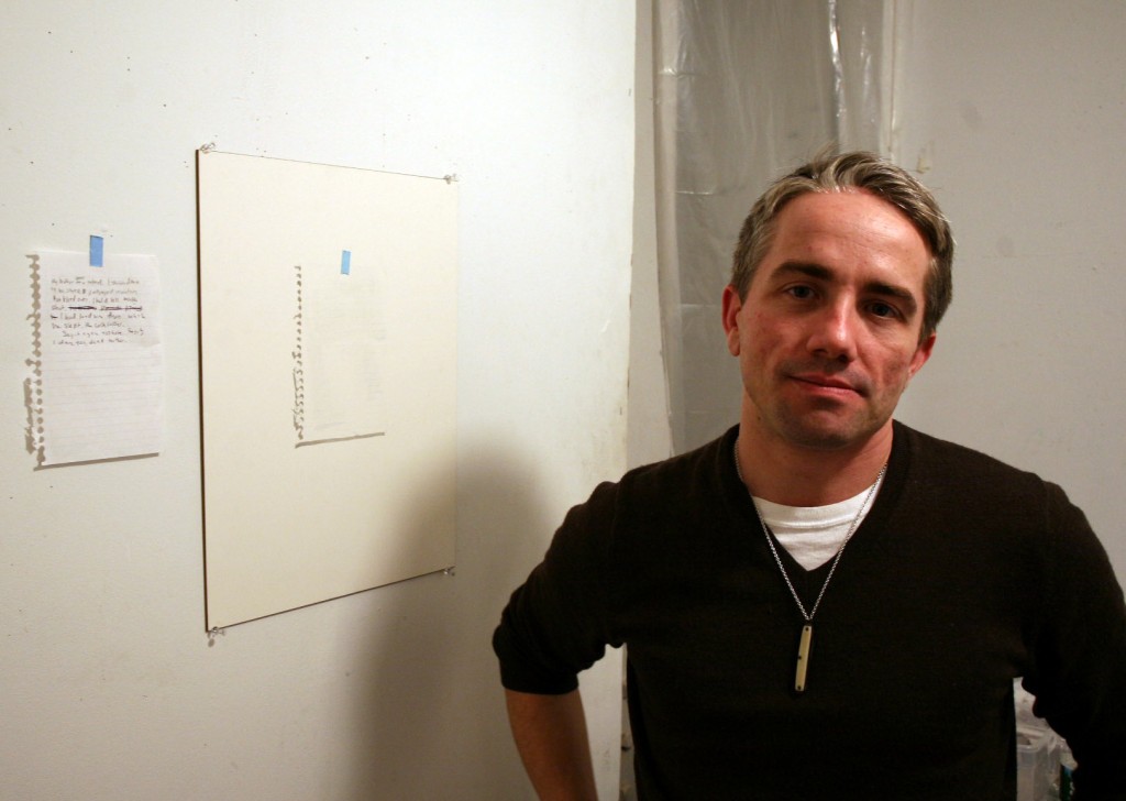 William Powhida in his studio. Photo by Dean Dempsey