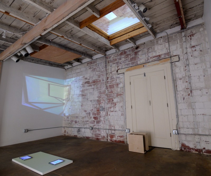 Installation view, clockwise from left: Aaron Finnis, HCI, 2014 (floor), Amy M. Ho, Up, 2014 (skylight), and Cybele Lyle, Changing the Planes, 2014.