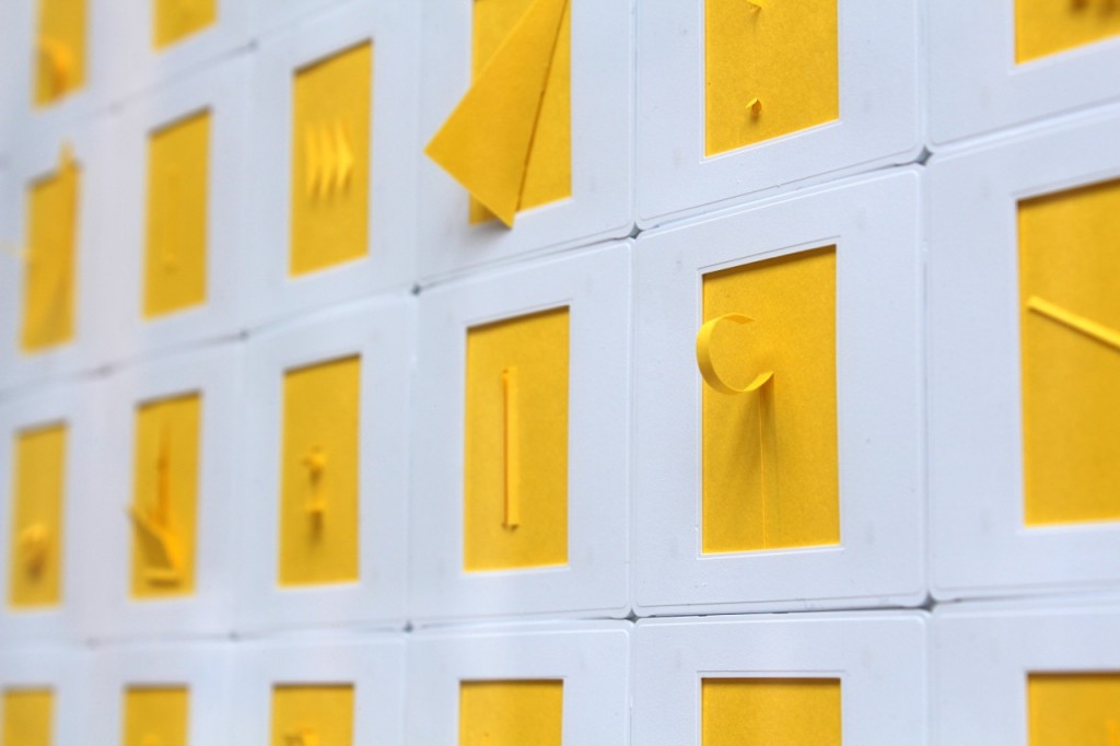 Marco Maggi, "Monochrome (Solar Yellow)," 2014. Cuts and folds on 225 35mm papers in slide mounts (detail). Courtesy of Hosfelt Gallery.