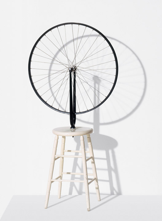 Marcel Duchamp "Bicycle Wheel", 1916/64 Metal wheel mounted on painted wood stool, 51 x 25 x 16 inches / 129.5 x 63.5 x 40.6 cm. © Succession Marcel Duchamp / ADAGP, Paris / Artists Rights Society (ARS), New York 2014. Courtesy Gagosian Gallery. Photo by Philippe Migeat.