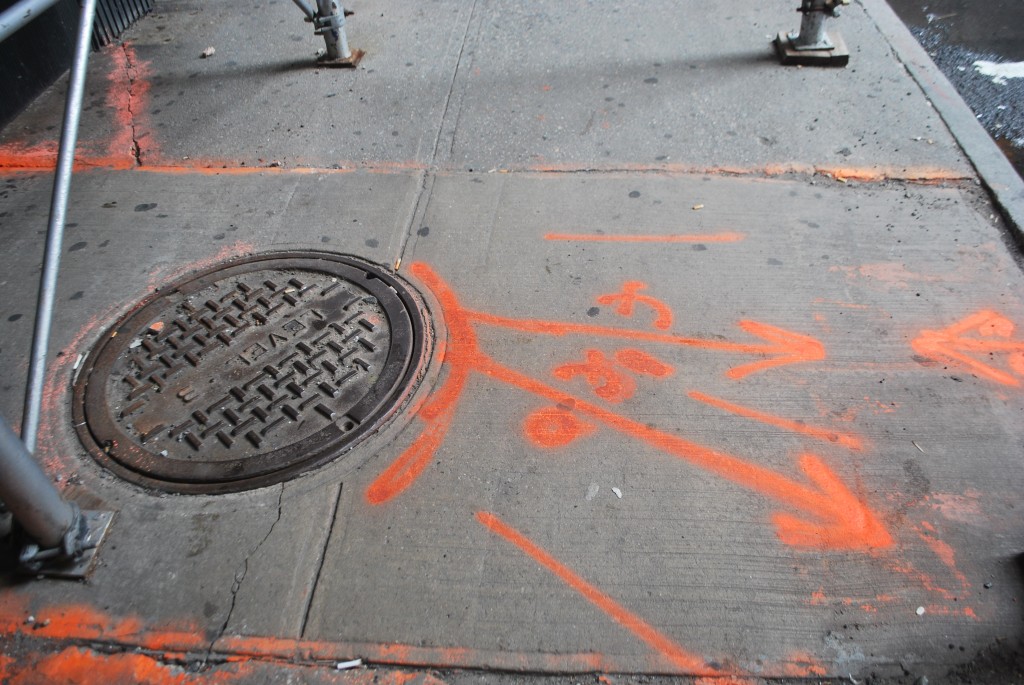 Level 3 Communications manhole and cable markings, lower Manhattan, 2014. Photograph by Ingrid Burrington.
