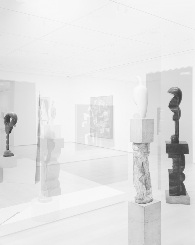 Simon Starling, "Pictures for an Exhibition," 2014. 20" x 24" silver gelatin print. Constantin Brancusi, "Socrates" (1922)  "Maiastra" (1910-12) and "Adam & Eve" (1916-21) (from left to right). Collections: Museum of Modern Art, New York, The Guggenheim Museum, New York. Courtesy of the artist, Casey Kaplan Gallery and Artist Rights Society. 