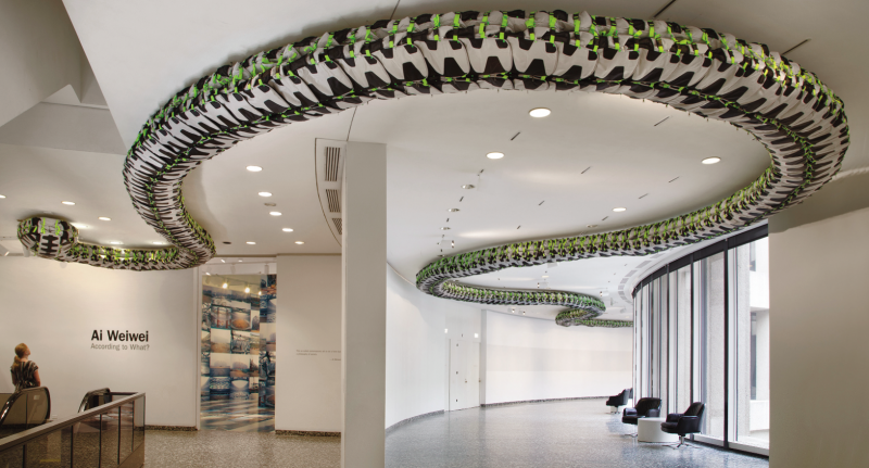 Ai Weiwei, "Snake Ceiling," 2009. Back packs, 15 3/4 x 354 5/16 in. (40 x 900 cm). Collection of Larry Warsh. Installation view of Ai Weiwei: According to What? at the Hirshhorn Museum and Sculpture Garden, Washington D.C., 2012. Photo by Cathy Carver.