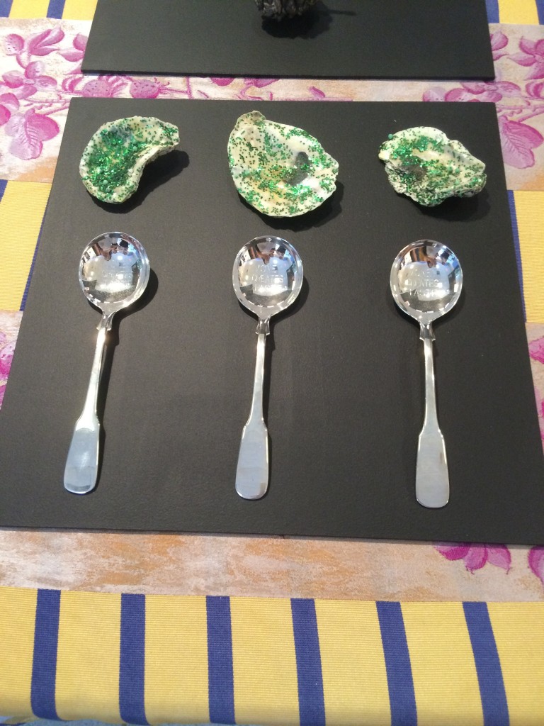 Oyster shells: Tue Greenfort; Spoons: Jenny Holzer; Tablecloth: Allison Katz, Sculpture Center, New York.