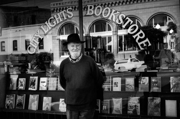 Lawrence Ferlinghetti in front of City Lights in 1996, as seen in Ferlinghetti: A Rebirth of Wonder, a film by Chris Felver. Photograph by Chris Felver.