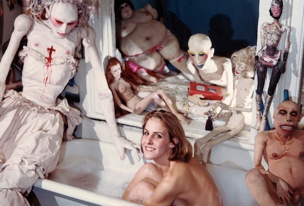 Eric Kroll, Greer Lankton Surrounded by her Sculpture, 1984. C-print, 19 1/2 x 15 1/2 inches.