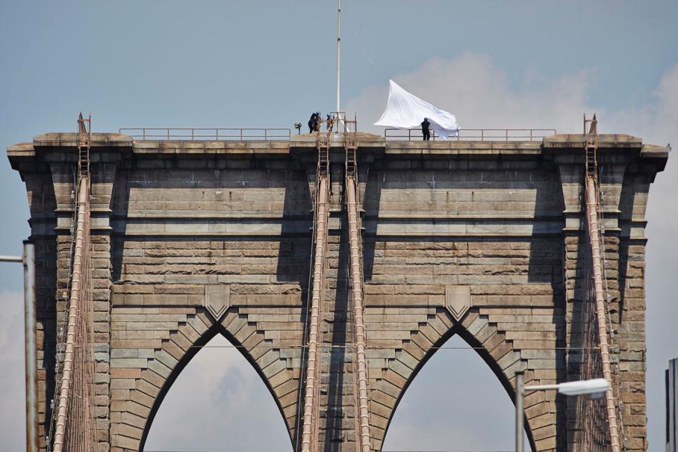 White Flags on top of the Brooklyn Bridge, New York City, 2014. Photo by James Keivom/New York Daily News.