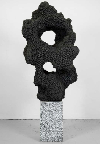 Napalm Stone (Graphite Version #1), 2014. Napalm, play-dough, powdered graphite, terrazzo. 67 x 30 x 22 in. Image Courtesy of Gallery Wendi Norris, San Francisco.