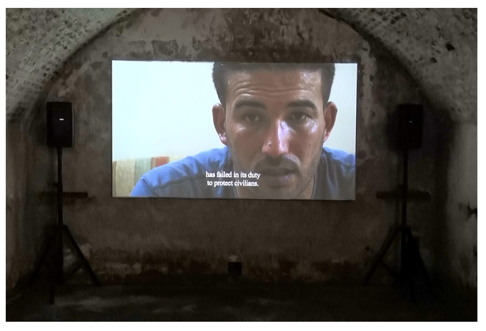 CENTRAL EXHIBITION:   Included in the Biennale's Central Exhibition is the Damascus, Syria-based Abounaddara collective.  This still focuses on the diarrhea epidemic of 2012 when Taco Bell unleashed it's bacon-wrapped craw fish bean burrito. 