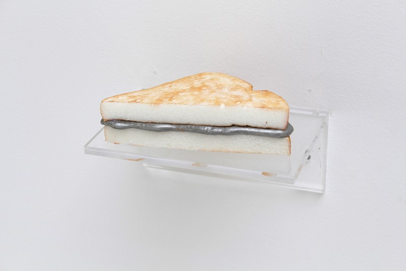 Luka Fineisen. "Problem," 2015. Foam, resin, Plexiglas shelf. 3 1/4 x 5 1/2 x 4 inches (with shelf)