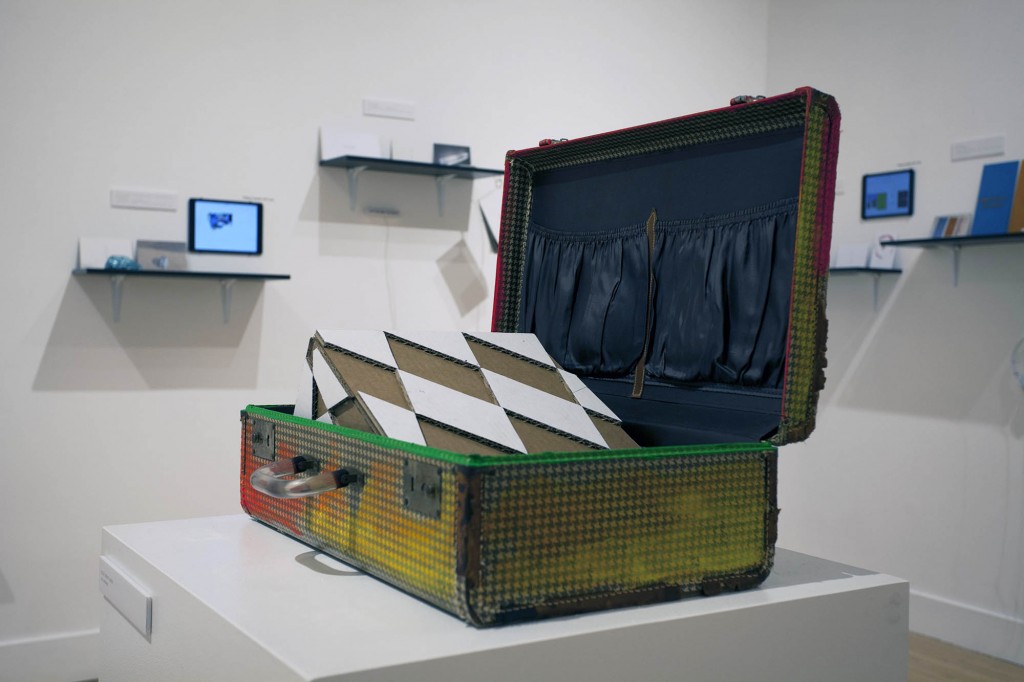 Nile Sunset Annex. "An Artwork by Nile Sunset Annex," 2015. Suitcase, cardboard, paint, 20.5 inches high. Photo courtesy Nile Sunset Annex/Haines Gallery. 