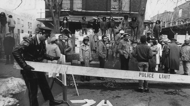 MOVE members and police during the 1978 confrontation outside MOVE headquarters.