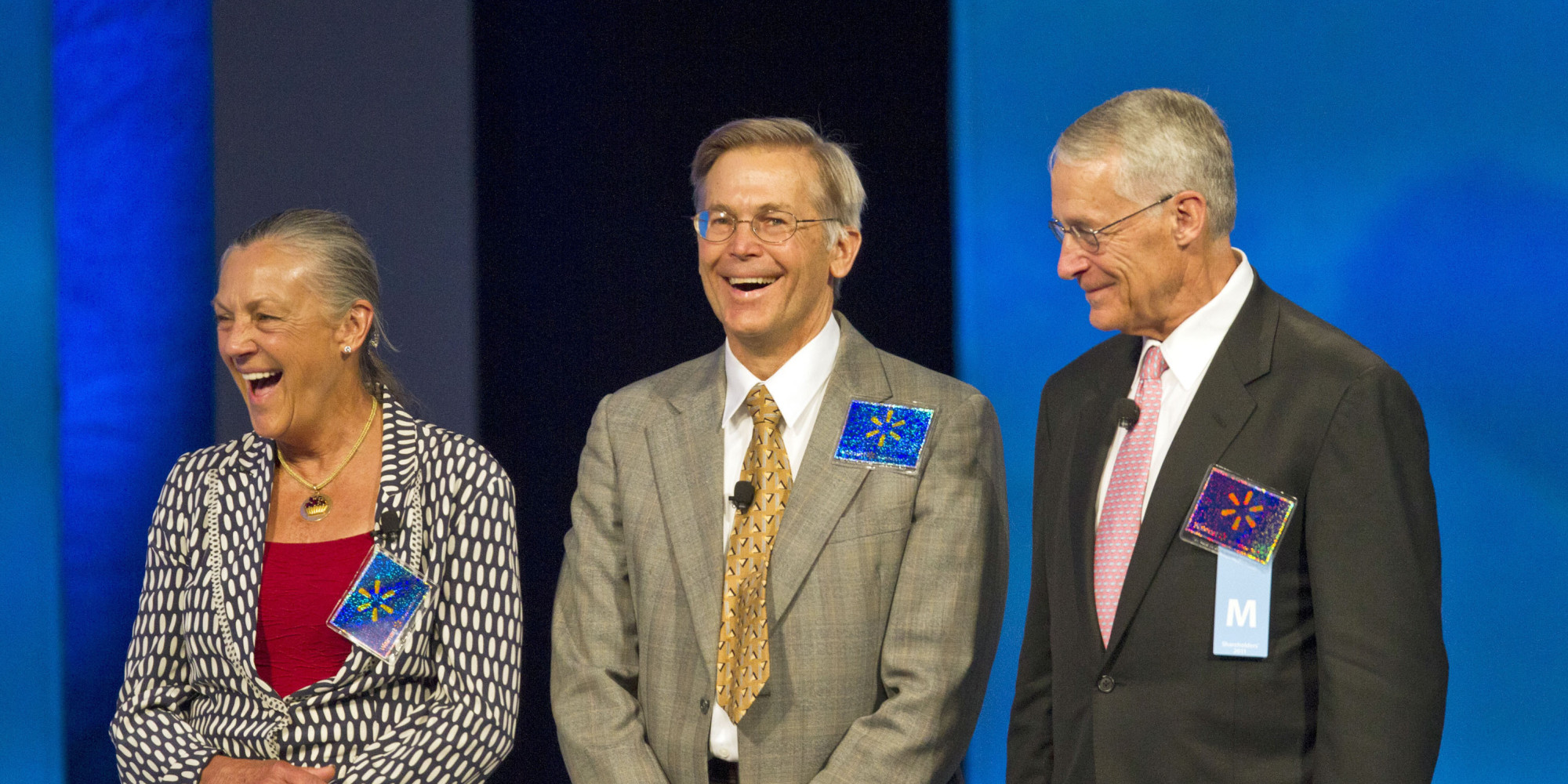 Alice Walton, Jim Walton and Wal-Mart Chairman Rob Walton, the children of the late Wal-Mart Stores Inc. founder Sam Walton, appear on stage during the company's annual shareholder meeting in Fayetteville, Arkansas, U.S., on Friday, June 3, 2011.
