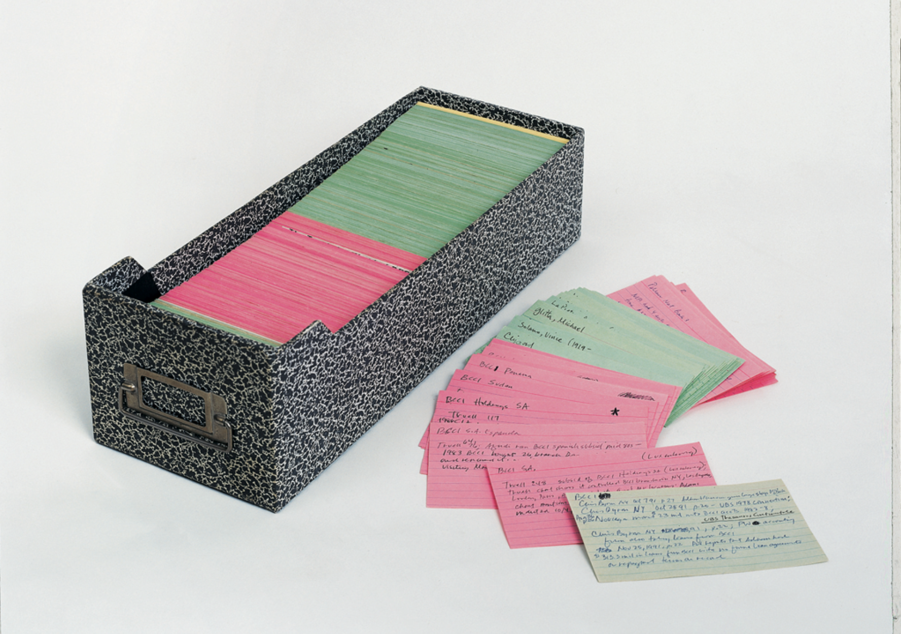 Mark Lombardi's index cards, with notes from his research on the activities of individuals and groups implicated in the financial scandals he was investigating, 1998-2001. Photograph by John Berens. Courtesy of Donald Lombardi and Pierogi Gallery.