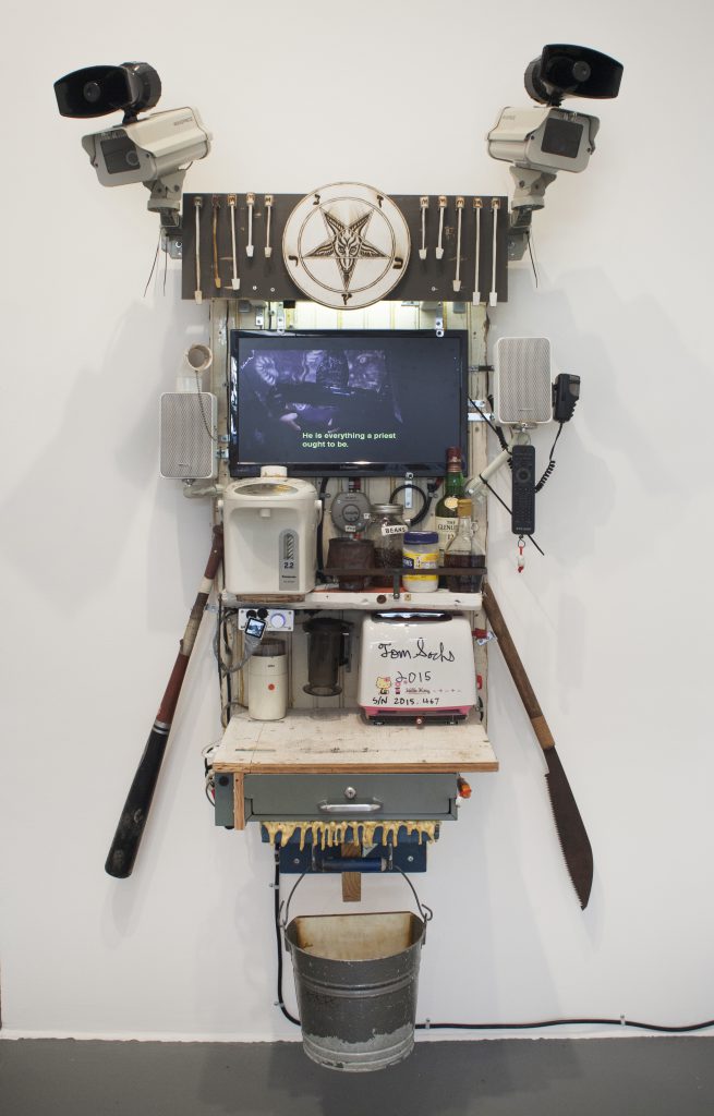 Tom Sachs, Breakfast, 2016. Wood, steel, stoneware, porcelain, toaster, tv, pirated DVDs, water boiler, coffee, sugar, maple syrup, whiskey, stereo amplifier, speakers, surveillance cameras, loudspeaker, epoxy resin and fiberglass. 70 x 42 x 30 inches.