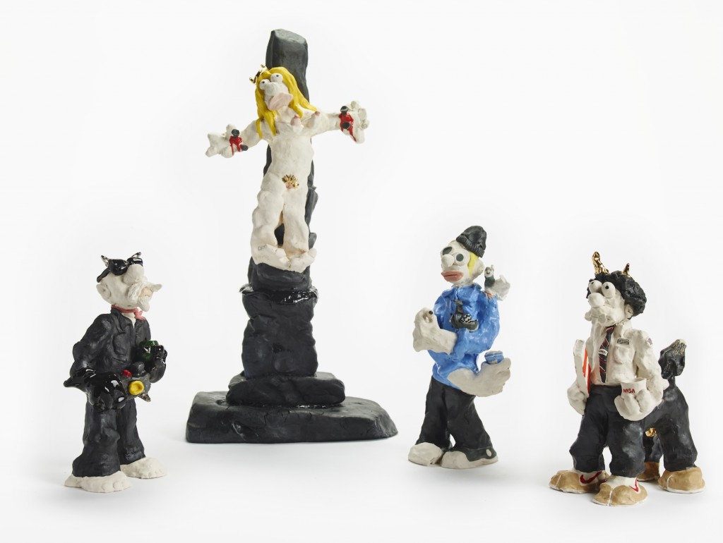 Mary Frey, The Crucifixion of Satan Ceramics, 2016. English porcelain engobe, gold,  silver luster, and resin carbon fiber. From left to right: JJ: 8.5 H x 4.25 W x 3 D inches, Mary (on crucifix): 17.75 H x 9.5 W x 5.25 D inches, Pat: 10 H x 3 W x 3.5 D inches, Tom: 9.5 H x 5.75 W x 4 D inches.
