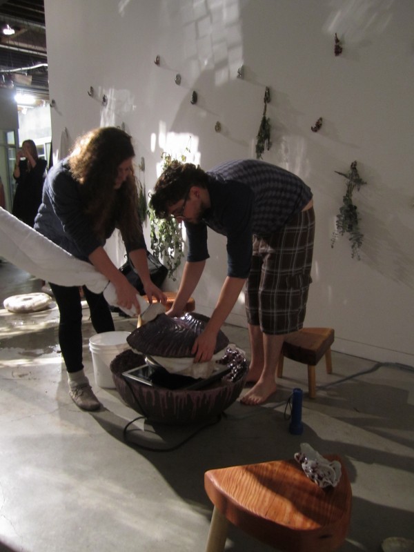 Steam Work, 2016. Wesley Hicks adjusts the heat apparatus and essential oils, courtesy of the artist and Southern Exposure. Photo: LLutz