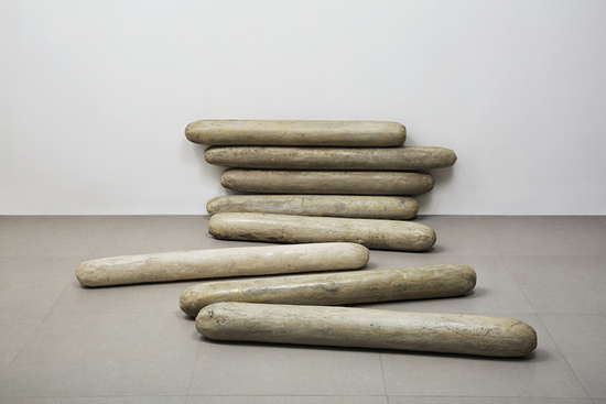 Anna Maria Maiolino, São 8 [They Are 8], 1993. Moulded cement, 39 3/8 x 49 1/4 x 5 1/8 inches. © Anna Maria Maiolino. Photograph by Everton Ballardin. Courtesy of the artist and Hauser Wirth & Schimmel.