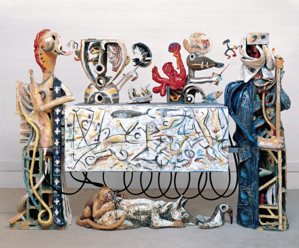 Robert Arneson, Guardians of the Secret II (Front View), 1989-1990. Glazed ceramic, wood, plexiglass, steel, canvas, epoxy, and mixed media, 86 x 119 x 26 inches.