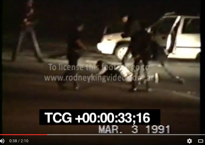 Still from video, Rodney King beating, 1991. Courtesy the Internet. 