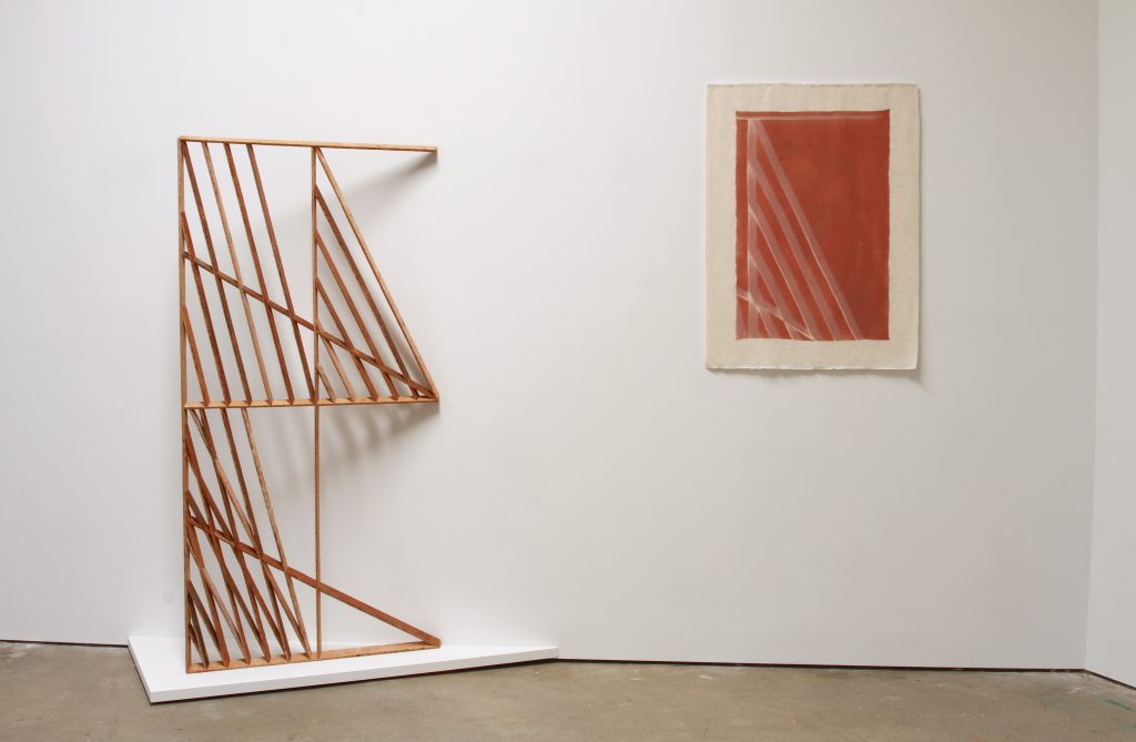 Andy Vogt,Left: Shadeshape 3, 2011. Salvaged wood lath, 71” x 34” x 1.5". Right: Untitled (02012016 red + green), 2016. Light oxidized pigment on cotton, 37" X 27.75”. 