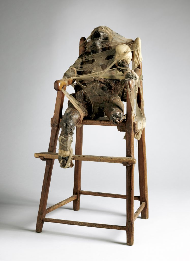 CHILD, 1959. Wax, nylon, fabric, metal, twine, and wood high chair, 34.625 × 17 × 16.5 inches. Collection of the Museum of Modern Art, New York, gift of Philip Johnson; © 2016 Conner Family Trust, San Francisco / Artists Rights Society (ARS), New York. Courtesy of the San Francisco Museum of Modern Art.