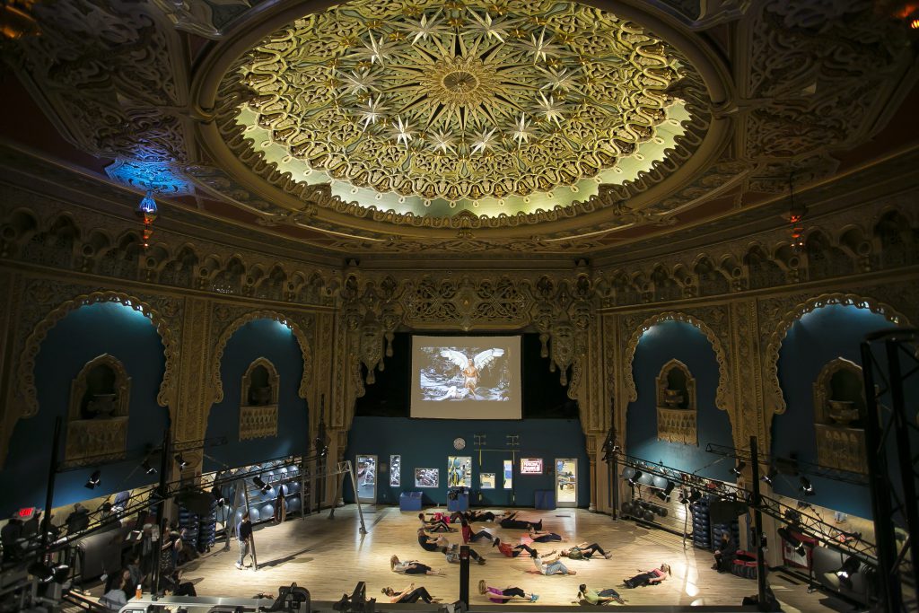 Audience participating in the Alhambra 1926-1996 exercise class. Courtesy the artists.