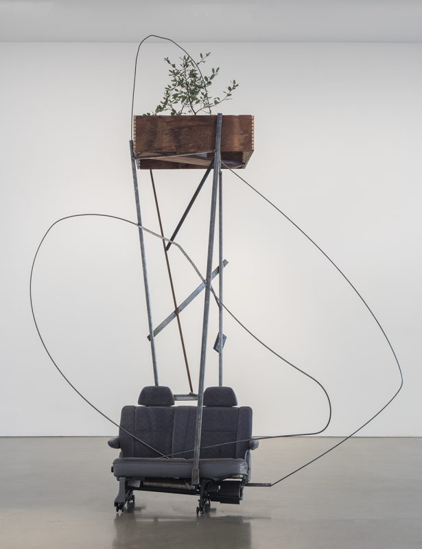 Abraham Cruzvillegas, Autoconcanción III, 2016. Steel, wood, plants, cloth, vinyl, plastic, metal, elastic, polyester, portable radio. Photo Credit: Brian Forrest. Courtesy Regen Projects, Los Angeles