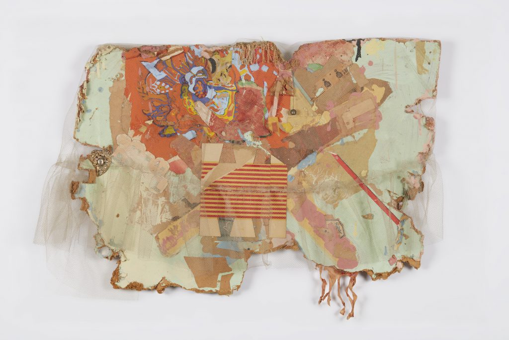 MEXICO COLLAGE, 1962; netting, paper, paint, ink stamps, fringe, bell, and costume jewelry on Masonite; 23 × 32 × 5 in. (58.4 × 81.3 × 12.7 cm); di Rosa Collection, Napa, California; © 2016 Conner Family Trust, San Francisco / Artists Rights Society (ARS), New York.