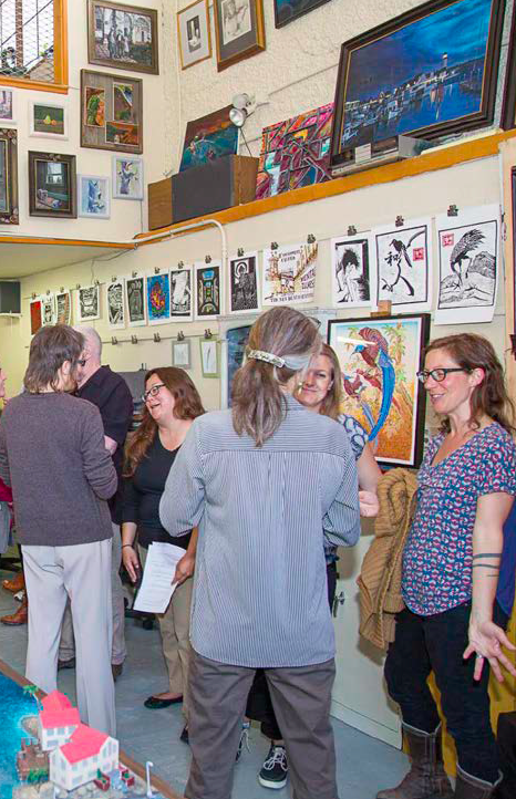Open studios at the San Quentin State Prison art studio with visitors from the public. Photograph by Peter Merts. Courtesy of San Quentin State Prison.