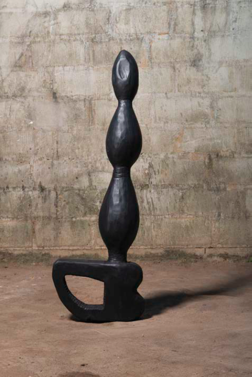 Alien (Mystim), 2014. Carved jacaranda wood, polish, stain. 50 inches tall. Courtesy of the artist.